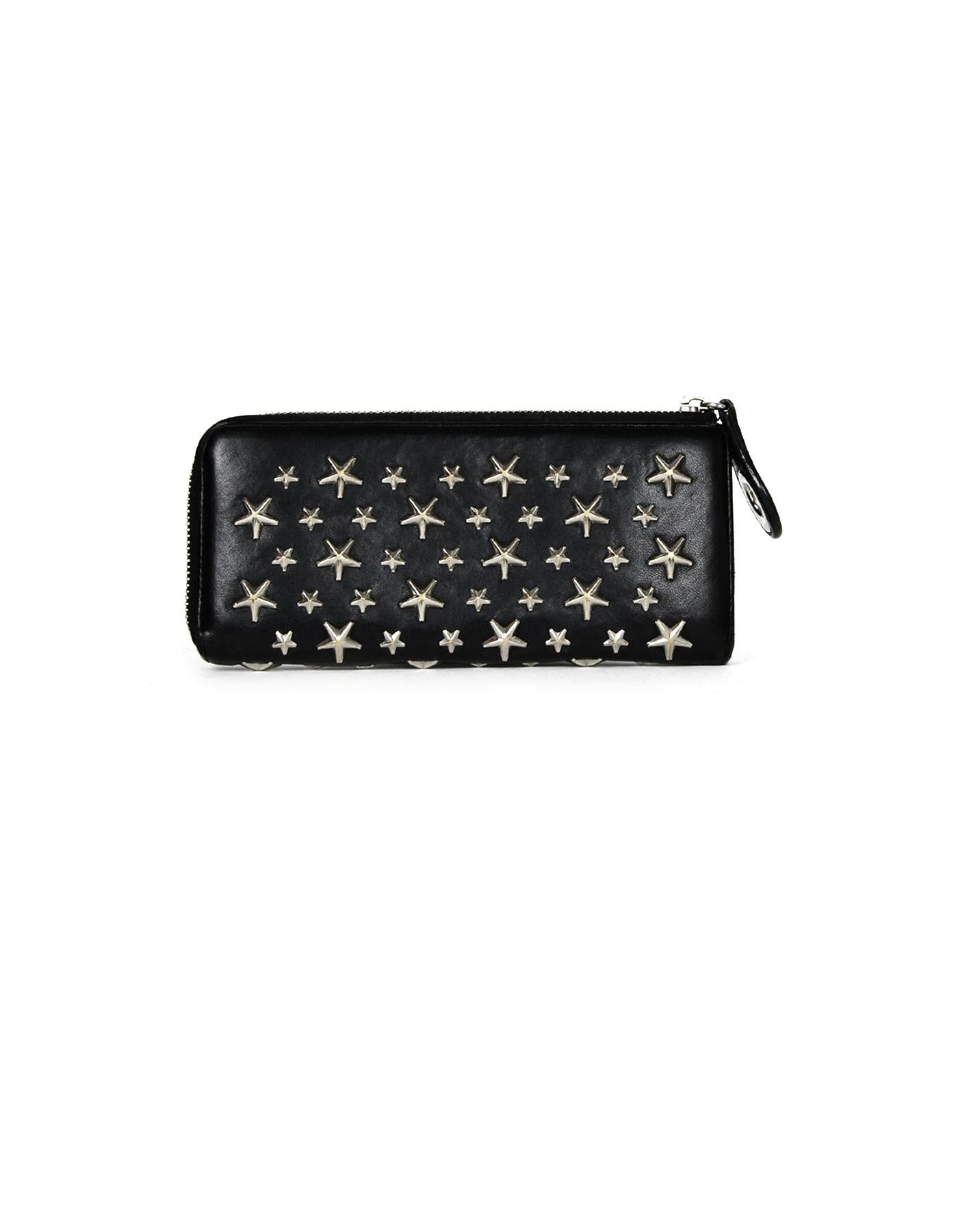 Jimmy Choo Black Leather Star Studded Zip Around Wallet 

Made In: Italy
Color: Black
Hardware: Silvertone
Materials: Leather
Lining: Leather and fine textile lining
Closure/Opening: Top zip
Exterior Pockets: None
Interior Pockets: Eight card