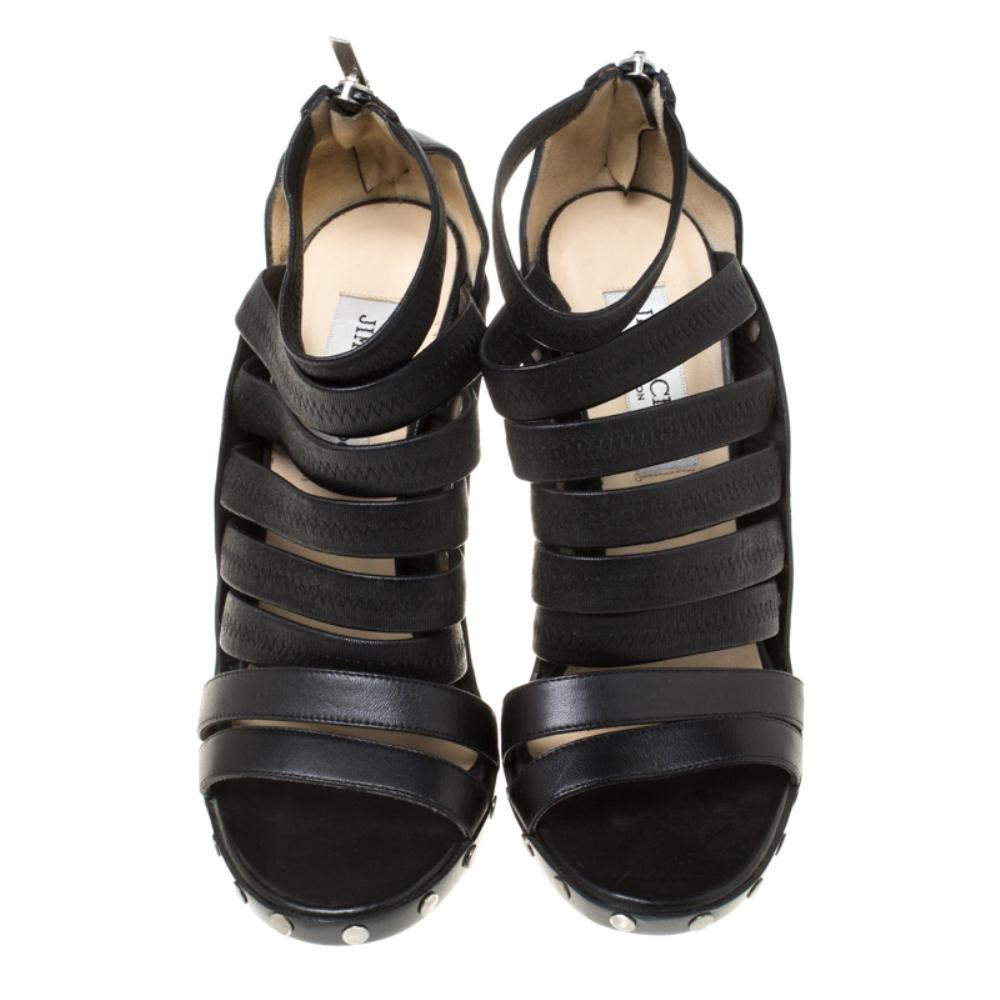 These sandals from Jimmy Choo are gorgeous! The sandals are crafted from leather in a strappy style. They feature leather insoles, back zippers, 12.5 cm high heels and platforms. You will surely love this black pair.

Includes: The Luxury Closet