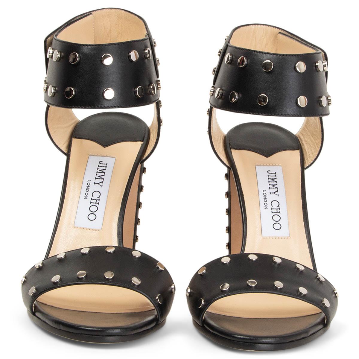 100% authentic Jimmy Choo Veto 100 ankle-strap sandals in black leather embellished with silver-tone studs. Brand new. 

Measurements
Imprinted Size	39
Shoe Size	39
Inside Sole	25.5cm (9.9in)
Width	8cm (3.1in)
Heel	10cm (3.9in)
Top