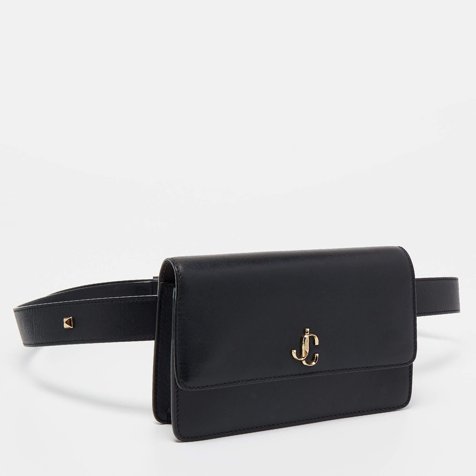 This belt bag from Jimmy Choo is an elegant creation with its simple yet practical design. It is crafted from leather and flaunts a black shade with gold-tone hardware. It will look super chic worn with jumpsuits and dresses!

