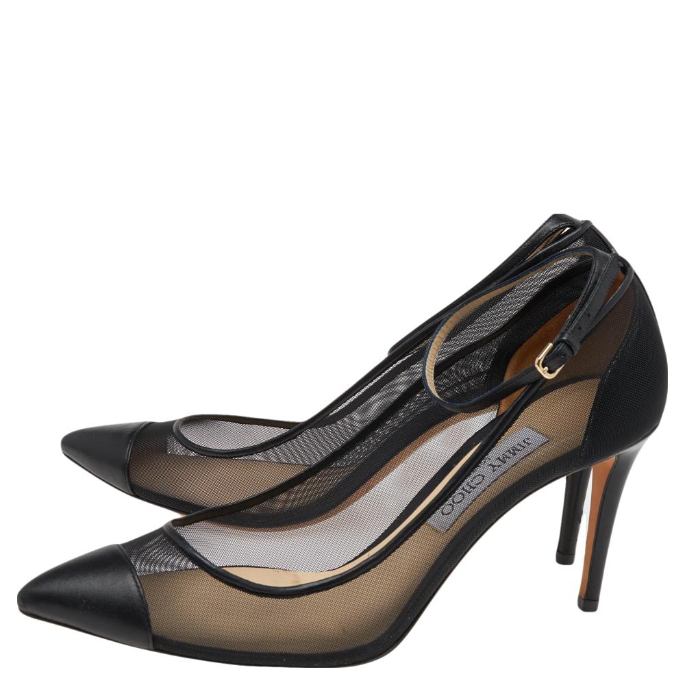 Crafted out of mesh and leather, these pumps will add a luxe touch to your overall look. They feature pointed toes, 9 cm heels, and buckle ankle straps. This stylish pair from Jimmy Choo will make a perfect addition to your collection of footwear.

