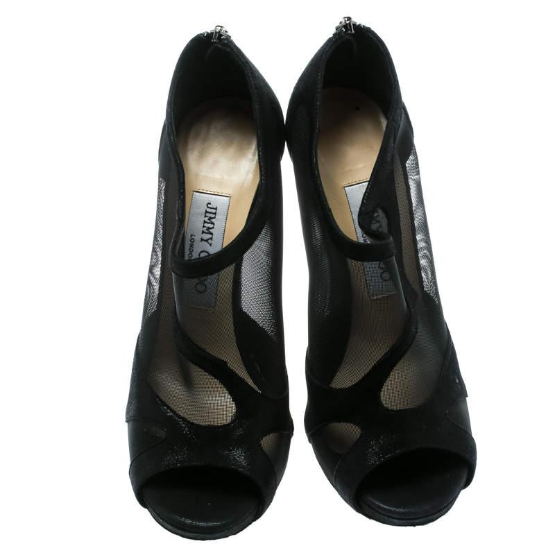Contemporary, edgy and chic, these booties from Jimmy Choo deserve all your attention! The black booties have been crafted from mesh and suede and styled in a peep-toe silhouette. They come equipped with comfortable leather lined insoles, zippers on