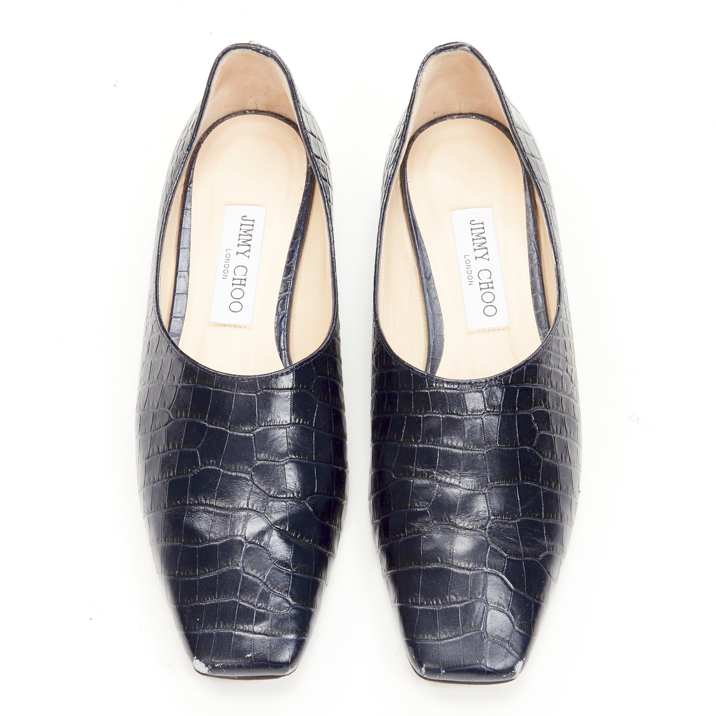 JIMMY CHOO black navy mock croc leather square toe JC charm flats EU38 
Reference: JACG/A00062 
Brand: Jimmy Choo 
Material: Leather 
Color: Navy 
Pattern: Solid 
Made in: Italy 


CONDITION: 
Condition: Good, this item was pre-owned and is in good
