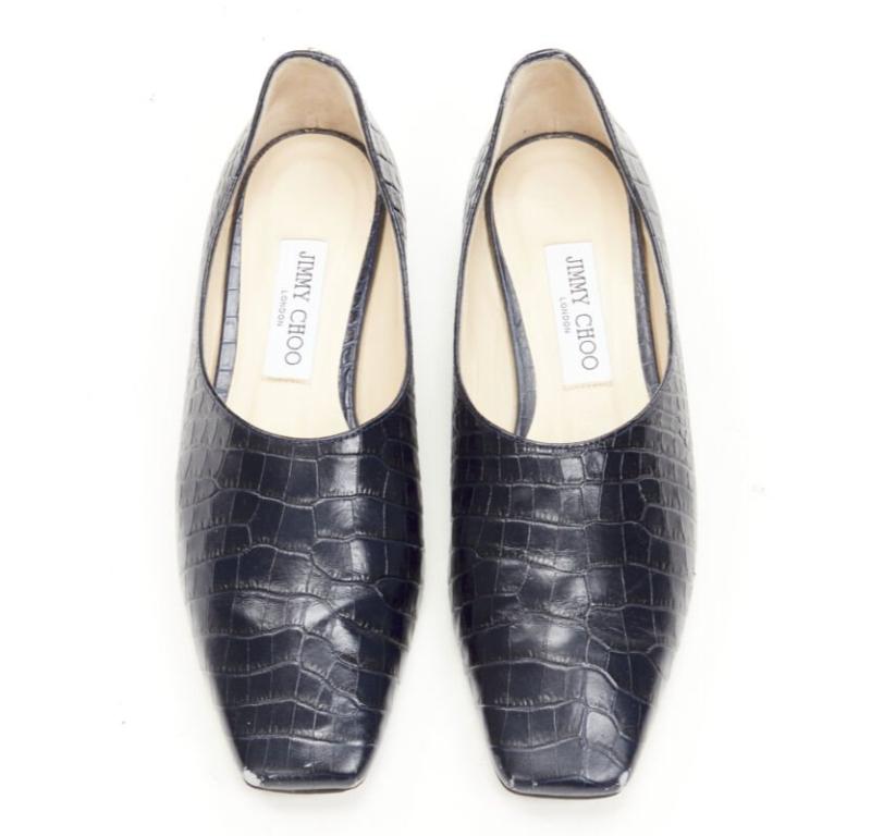 JIMMY CHOO - Chaussures à breloques à bout carré en cuir croco noir marine mock EU38
Référence : JACG/A00062
Marque : Jimmy Choo
MATERIAL : Cuir
Couleur : Marine
Motif : Solide
Doublure :  Cuir
Fabriqué en : Italie

CONDITION :
Condition : Bon, cet