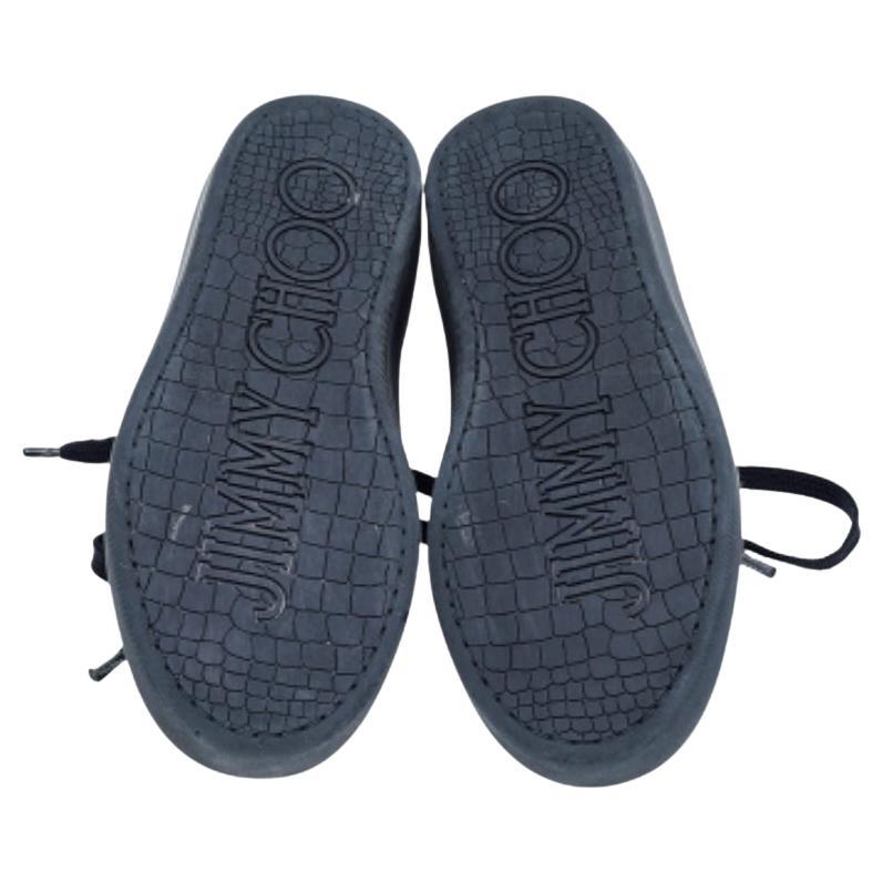 Queste sneakers di Jimmy Choo offrono il massimo del comfort. Sono state progettate con un profilo basso utilizzando pelle e vernice. Rifinite con l'allacciatura e l'etichetta sul tallone, sono perfette per essere indossate tutto il giorno.