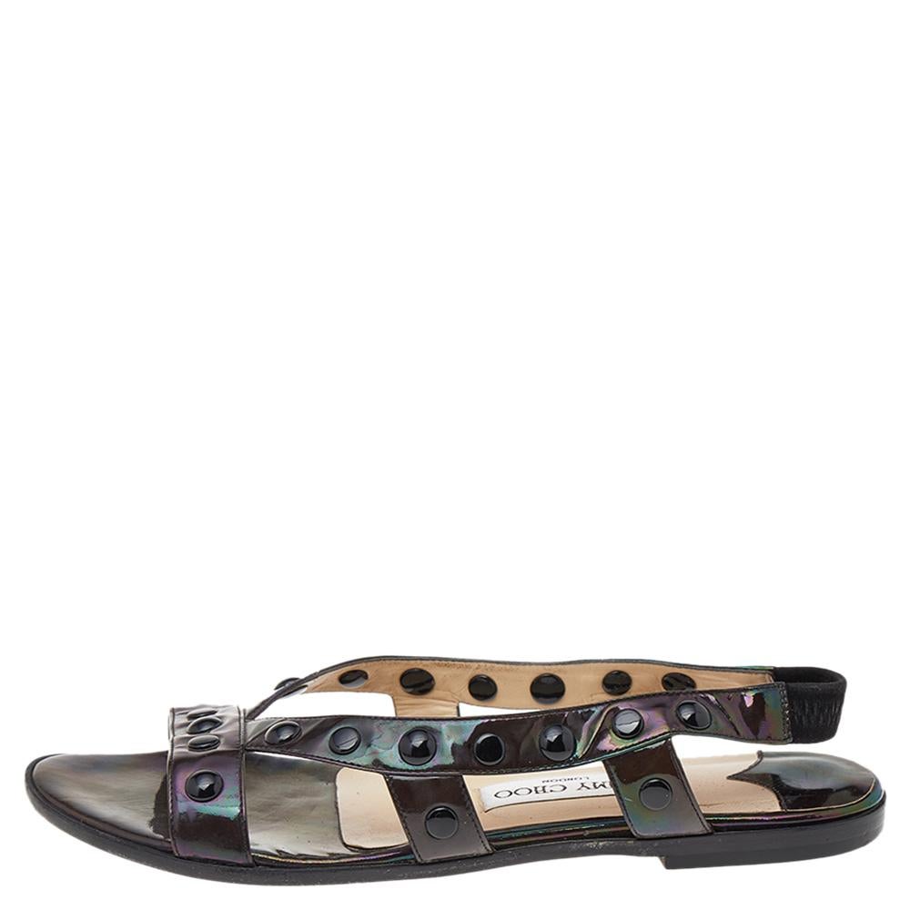 These sandals from Jimmy Choo are here to offer ultimate comfort and style to your feet. They are crafted using black patent leather and are adorned with embellishments on the upper. Match these super-trendy sandals with your attire as you head