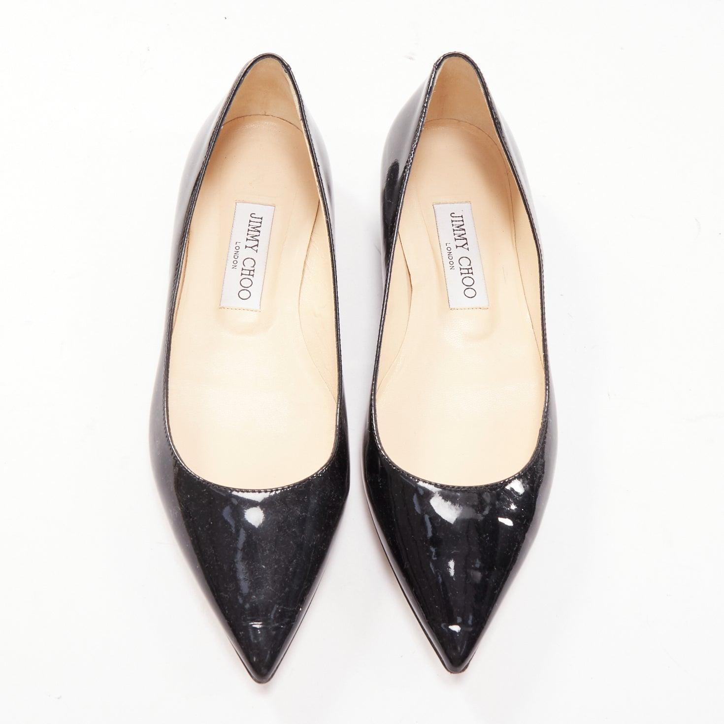 JIMMY CHOO chaussures plates à bouts pointus en cuir verni noir EU37
Référence : LACG/A00450
Marque : Jimmy Choo
MATERIAL : Cuir verni
Couleur : Noir
Motif : Solide
Fermeture : Slip On
Doublure : Cuir nude
Fabriqué en : Italie

CONDITION :
Condition