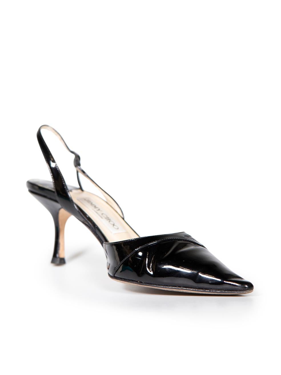 CONDITION is Good. Minor wear to shoes is evident. Light wear to overall leather with creasing on this used Jimmy Choo designer resale item.
 
 Details
 Black
 Patent leather
 Heeled sandals
 Point toe
 Front button detail
 Adjustable slingback