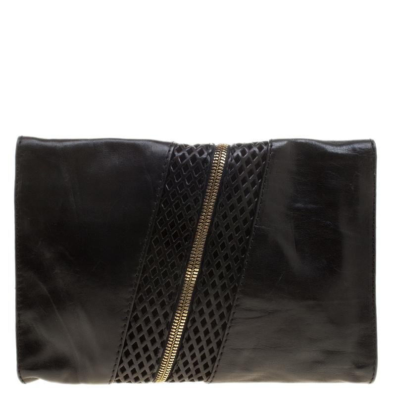 Sprinkle grace and style in every swing with this Martha clutch from Jimmy Choo. Crafted from black leather, the piece is styled with intriguing perforated pattern and gold-tone chain detailing at the center. The insides are lined with suede, and