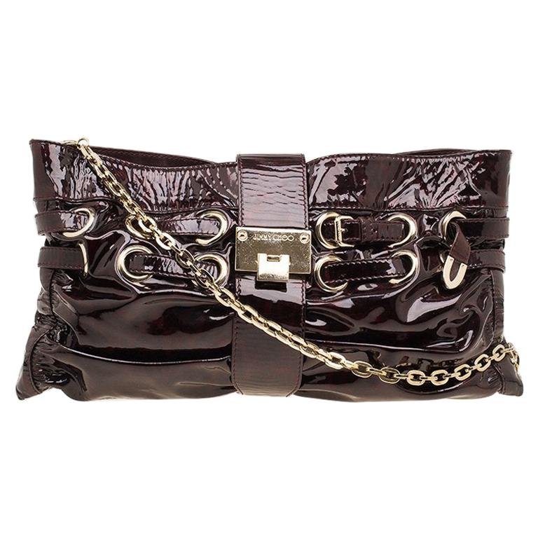 red patent leather clutch bag