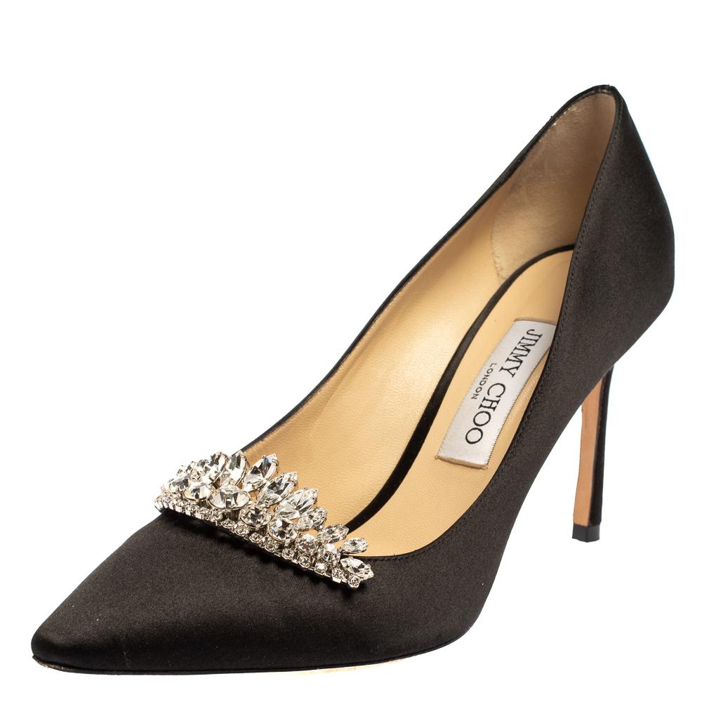 These exquisite pumps from Jimmy Choo are all you need to shine and make a statement like never before! In a lovely black shade, they come crafted from satin and feature pointed toes. They flaunt shimmering crystals embellished on the vamps and come