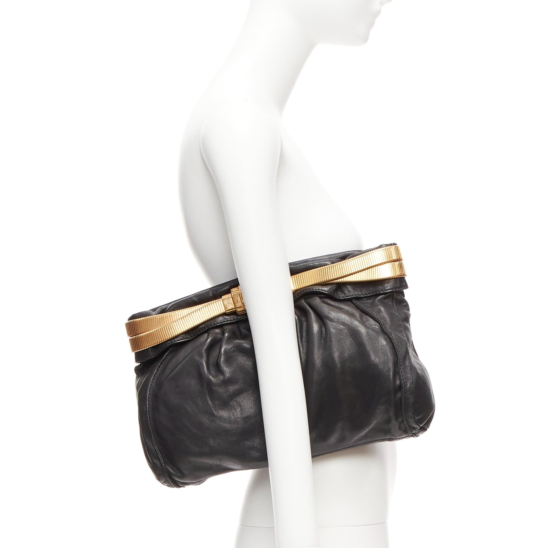 JIMMY CHOO black soft leather gold chain logo zip oversized clutch bag
Reference: CELG/A00407
Brand: Jimmy Choo
Material: Leather, Metal
Color: Black, Gold
Pattern: Solid
Closure: Zip
Lining: Beige Fabric
Extra Details: Crafted from pleated leather