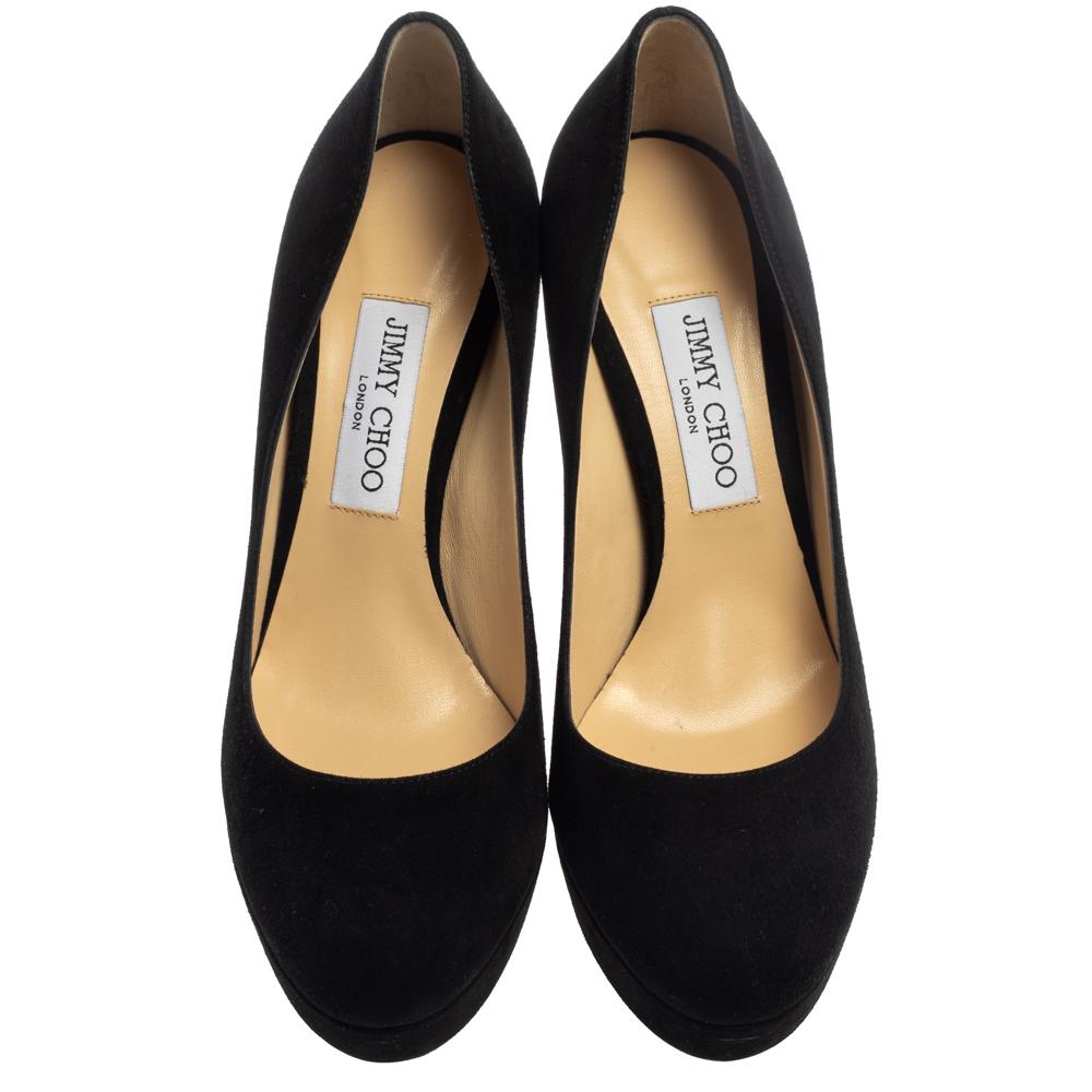 From the house of Jimmy Choo comes this gorgeous pair of pumps that is well-made and absolutely flaunt-worthy. They've been crafted from suede in a black shade and styled with platforms, insoles meant to give you comfort, and 12.5 cm heels to lift