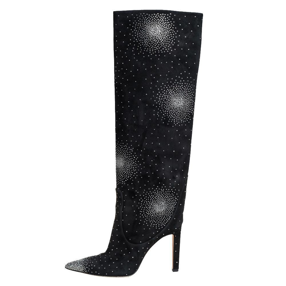 Make a statement with these chic knee-length boots from Jimmy Choo. They're crafted from suede and flaunt pointed toes, dazzling embellishments on the exterior, and comfortable leather-lined insoles. Standing tall on 11 cm stiletto heels, they are