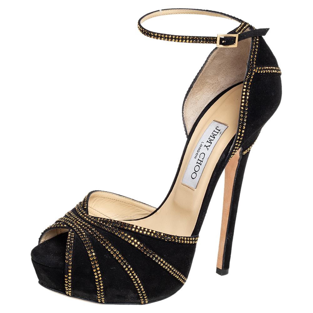 These Kalpa sandals from Jimmy Choo spell nothing but true luxury and are sure to fetch you admiring glances for every step you take! The black sandals are crafted from suede and feature a peep-toe silhouette. They flaunt embellished vamp straps and