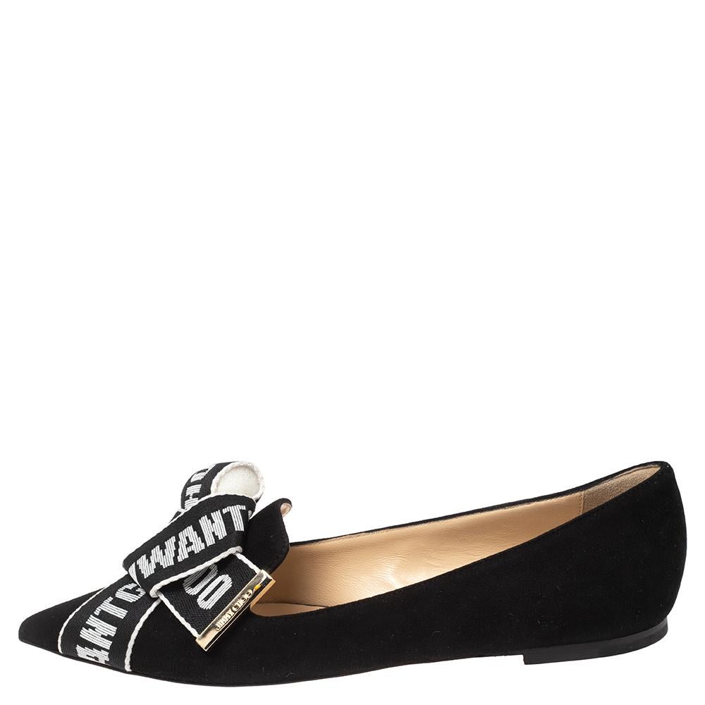 These chic ballet flats by Jimmy Choo are a must-have. They have been crafted from luxurious suede and feature a black hue on the exterior. They are designed with a logo-printed bow accent that accentuates the pointed toes. These ballet flats
