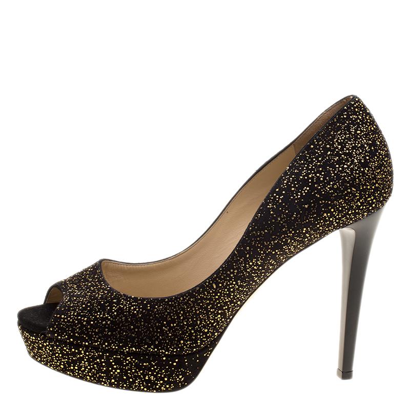 How can one not fall in love with these pumps by Jimmy Choo! They've been beautifully crafted from textured suede and designed with peep toes, platforms and 12.5 cm heels. The pumps are sure to complement all your dresses and evening
