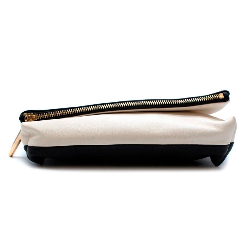 Jimmy Choo Black & White Leather Fashion Capitals Clutch Bag

- Made of soft leather 
- Fold over style 
- Fashion capitals print to the flap 
- Gold tone hardware 
- Zip fastening to the top 
- Inner pocket 
- Fun playful design