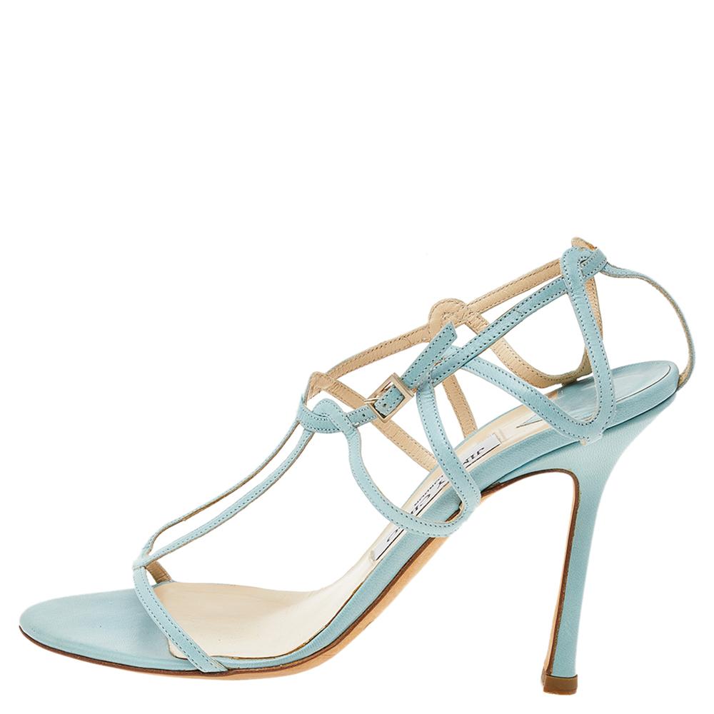 These T-strap sandals from Jimmy Choo will lend a stylish edge to your feet. They are crafted from blue leather and feature open toes, buckle fastening, and 10 cm heels.

Includes: Original Dustbag