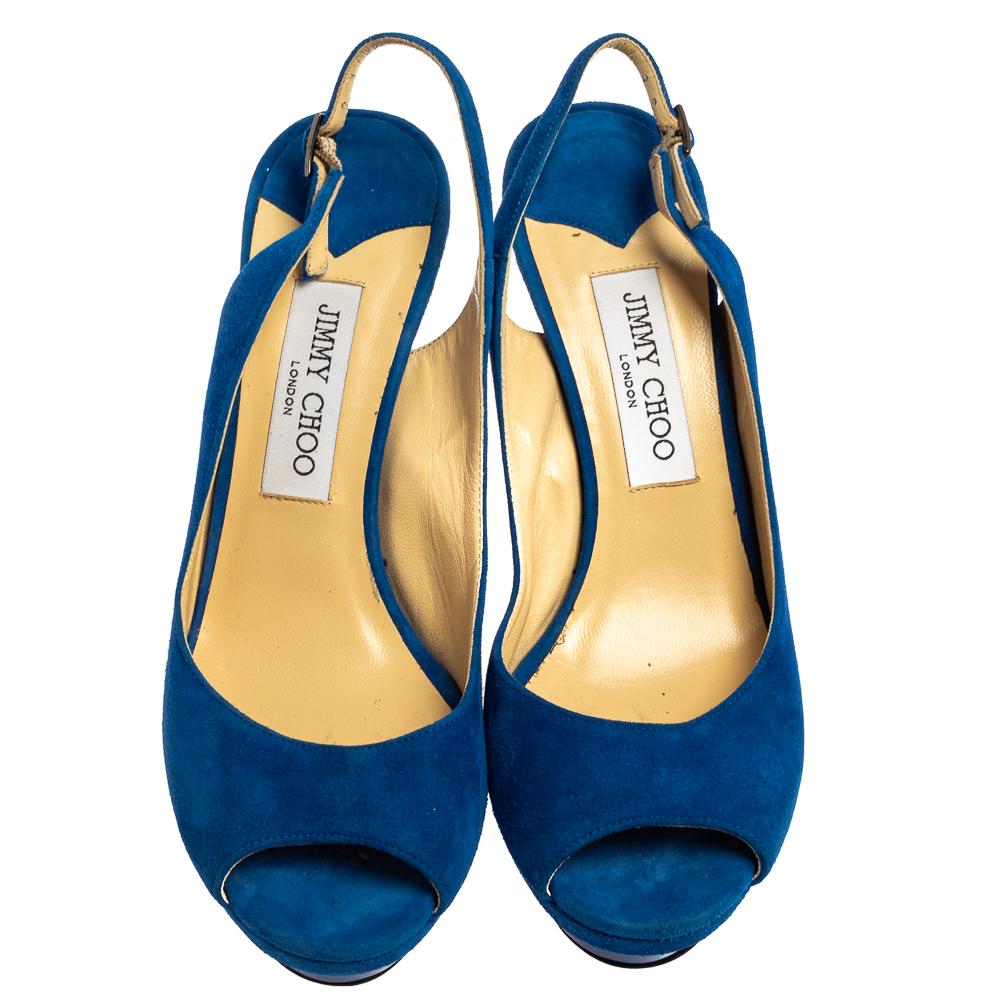 Get ready to dance all night long in these fabulous sandals from Jimmy Choo! The blue sandals are crafted from suede and feature an open-toe silhouette. They have been exquisitely styled slingbacks, comfortable leather-lined insoles, and are