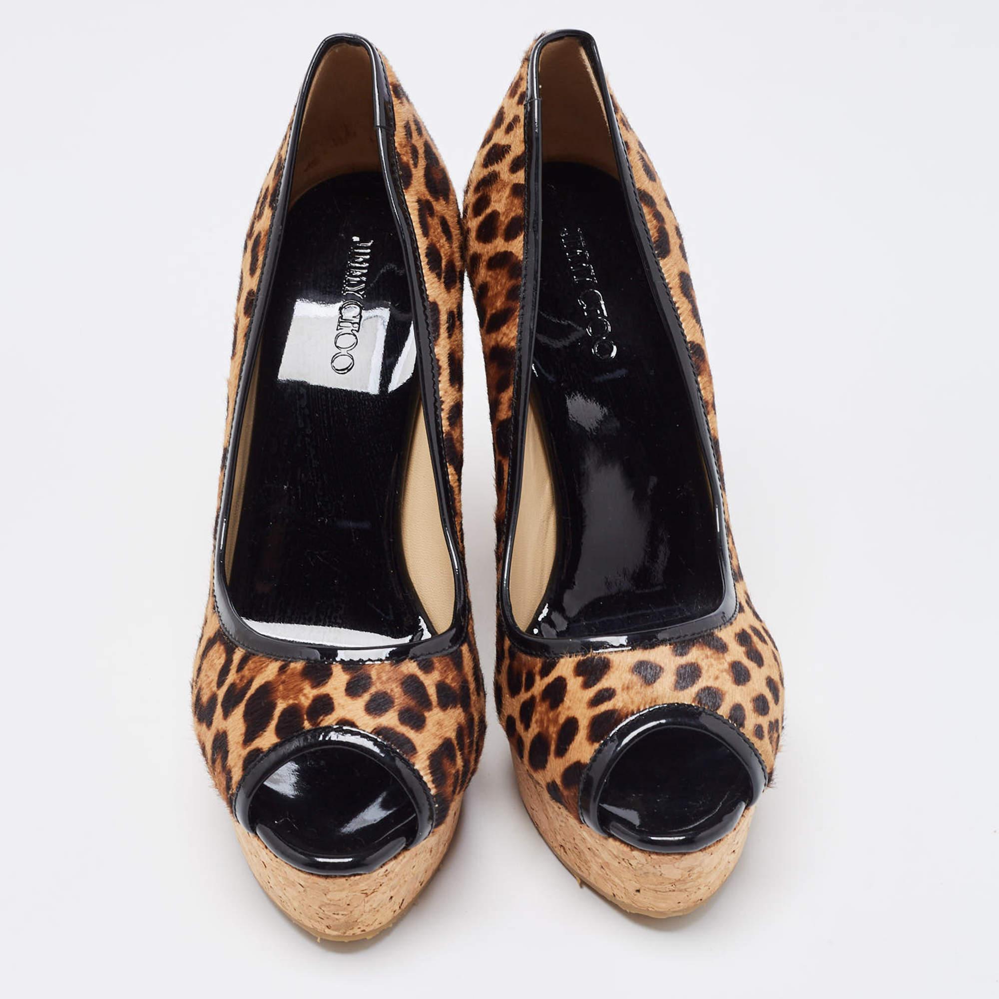 Make a chic style statement with these Jimmy Choo wedge pumps. They showcase sturdy heels and durable soles, perfect for your fashionable outings!

Includes
Original Box, Info Booklet