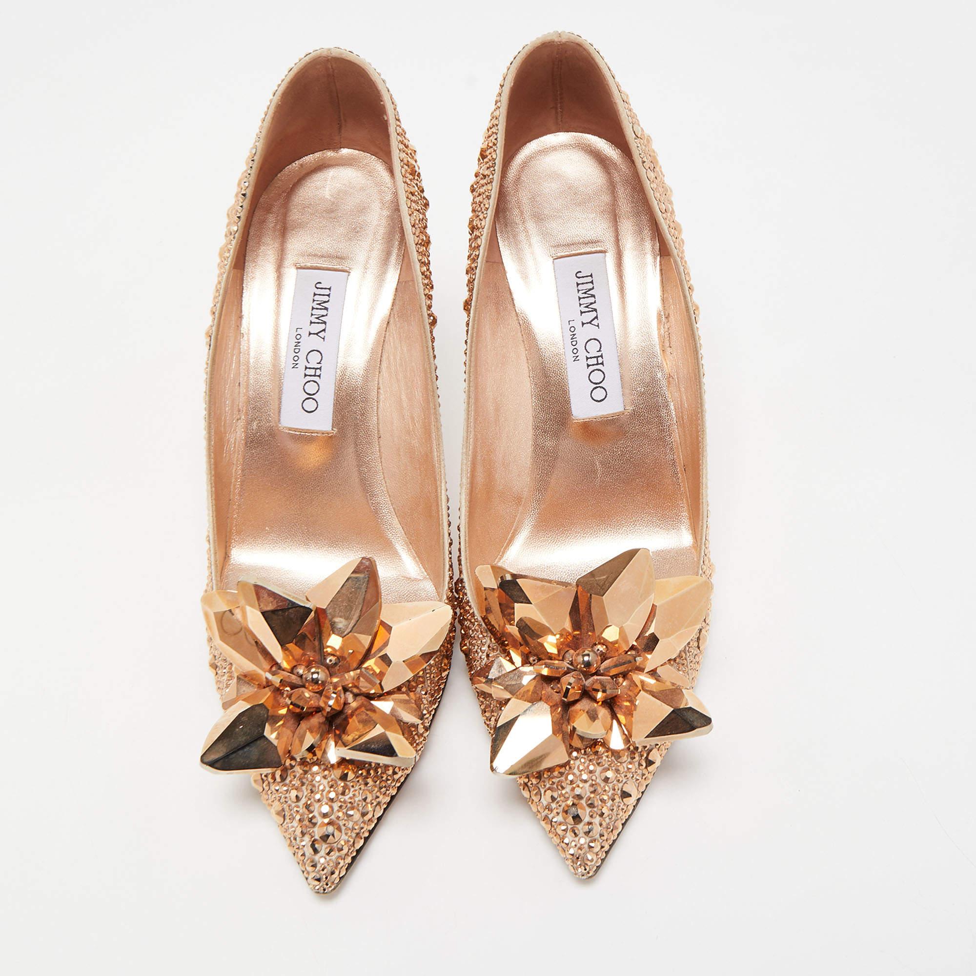 Deliver the most unforgettable looks with these pumps from Jimmy Choo! From their shape and detailing to their overall appeal, they are utterly mesmerizing. The pumps are crafted from crystals and satin. They are complete with comfortable insoles
