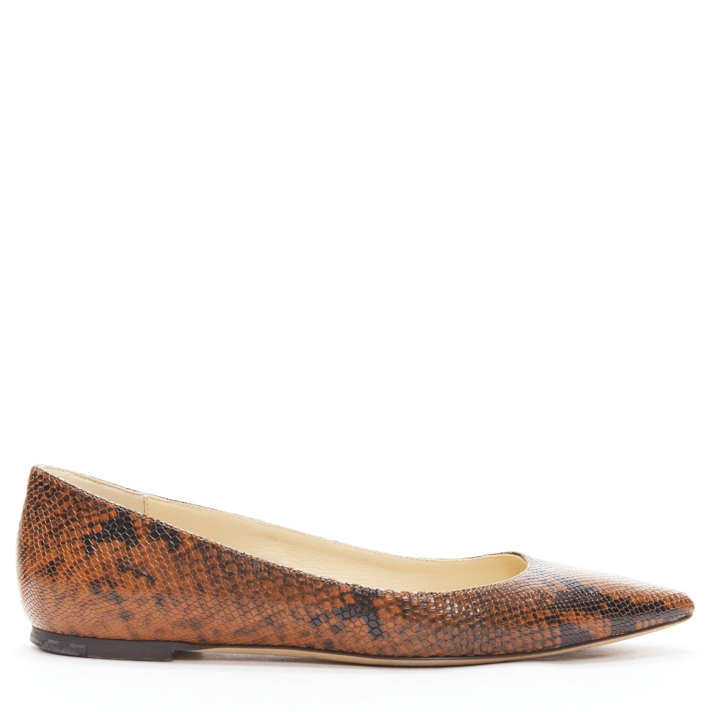 JIMMY CHOO brown embossed scaled leather pointed toe flat shoes EU37
Reference: SNKO/A00369
Brand: Jimmy Choo
Material: Leather
Color: Brown
Pattern: Animal Print
Closure: Slip On
Lining: Nude Leather
Made in: Italy

CONDITION:
Condition: Very good,