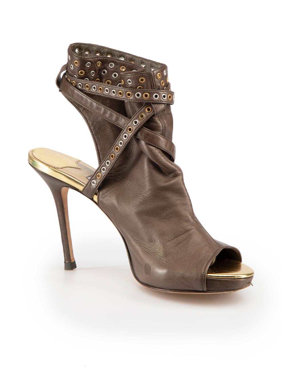 CONDITION is Good. General wear to heels is evident. Moderate signs of wear to overall leather with creasing on toe creases with moderate scuff marks and indentations to front toe caps and back of both heels on this used Jimmy Choo designer resale