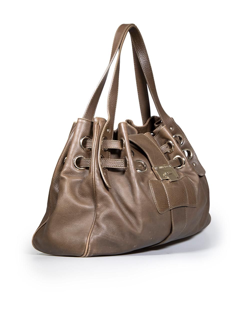 CONDITION is Good. Minor wear to bag is evident. Abrasions to base corners, leather piping around edges and leather handle edges. There are some scratches to front and back on this used Jimmy Choo designer resale item.
 
 
 
 Details
 
 
 Model: