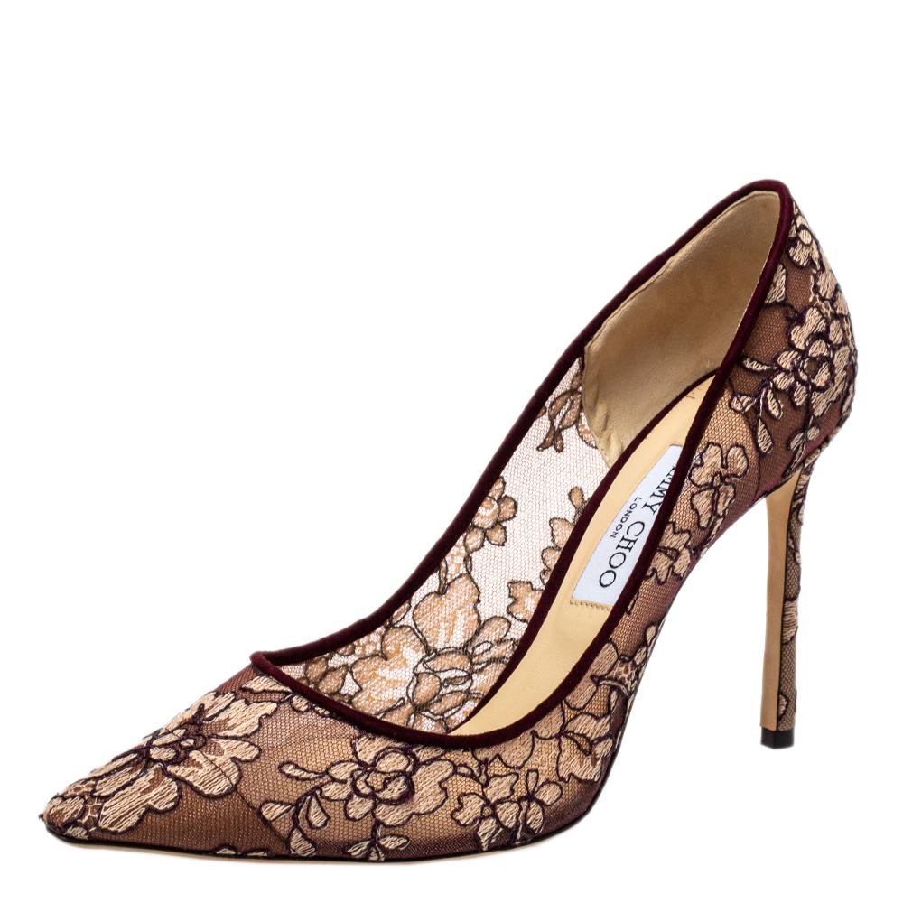 Known for their elegant and high fashion designs, Jimmy Choo never fails. Make a style statement while flaunting this pair that has been made in Italy. Crafted from mesh and fabric, they feature pointed toes, 10.5 cm heels, and snug insoles.

