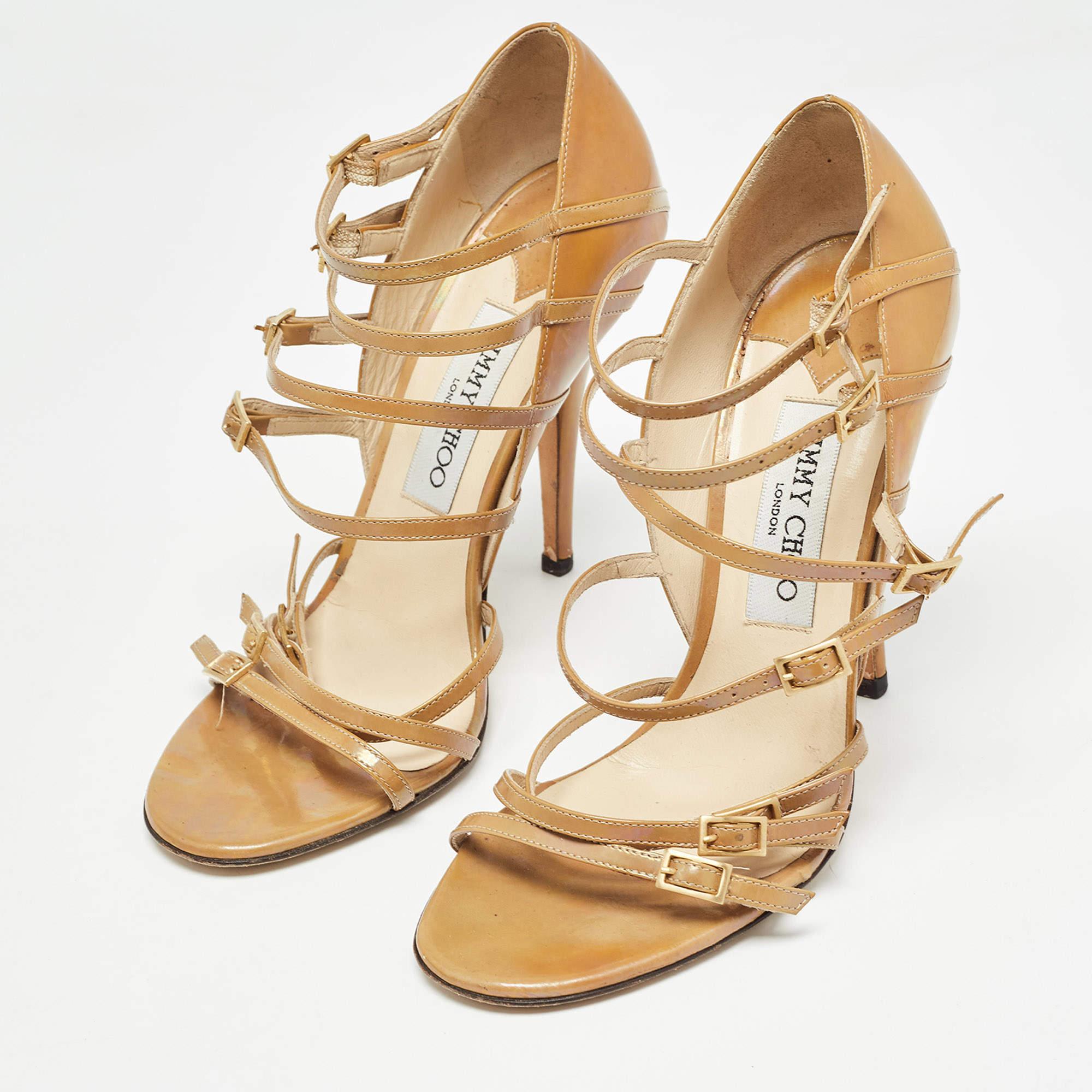 Jimmy Choo brings you the perfect pair of sandals to celebrate the season in. Crafted from patent leather these sandals are comfortable and easy to flaunt.
