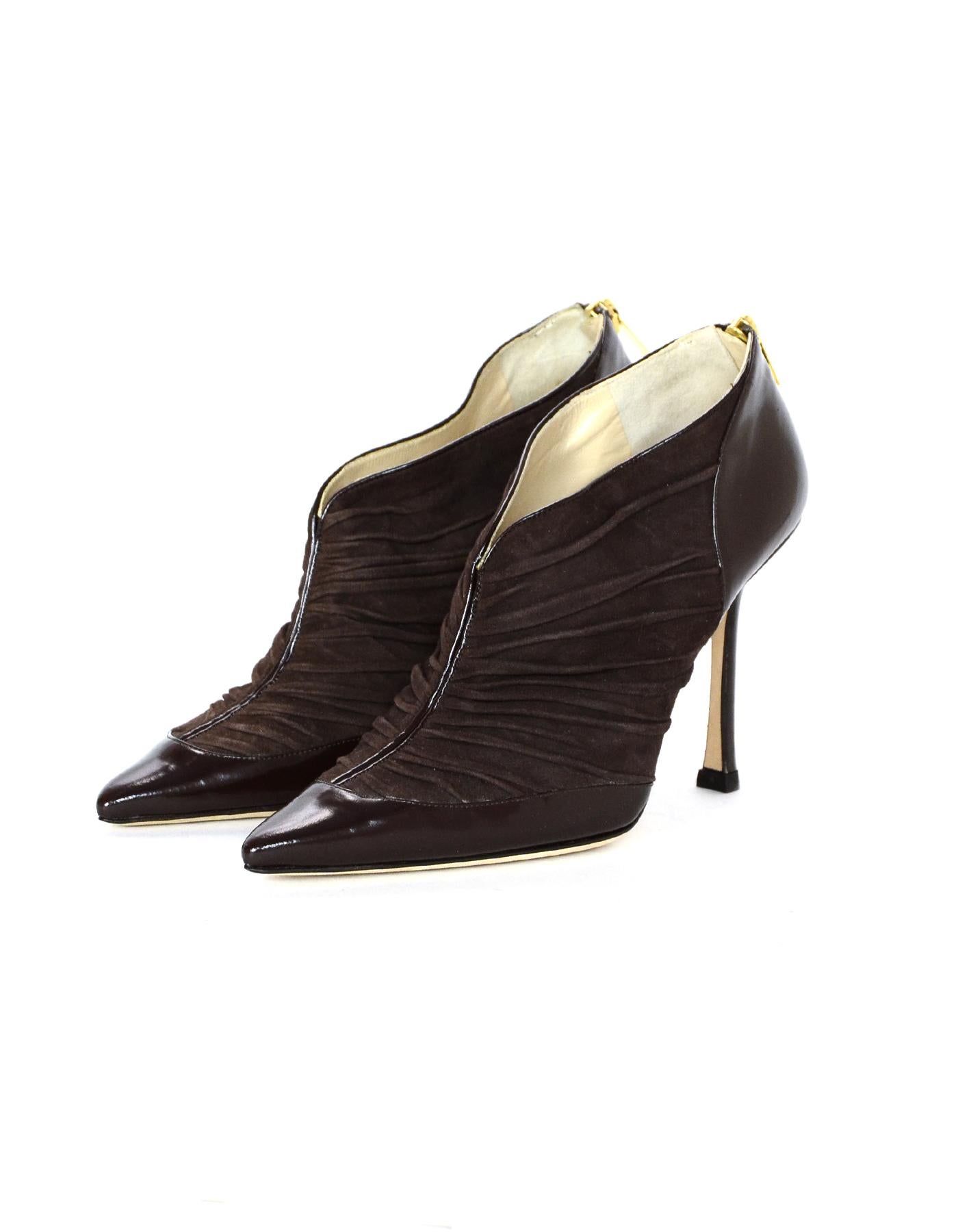 Jimmy Choo Brown Suede/Leather Ruched Point Toe Booties Sz 36

Made In: Italy
Color: Brown
Hardware: Goldtone
Materials: Suede, leather
Closure/Opening: Back zipper
Overall Condition: Excellent pre-owned condition   

Measurements: 
Marked Size:
