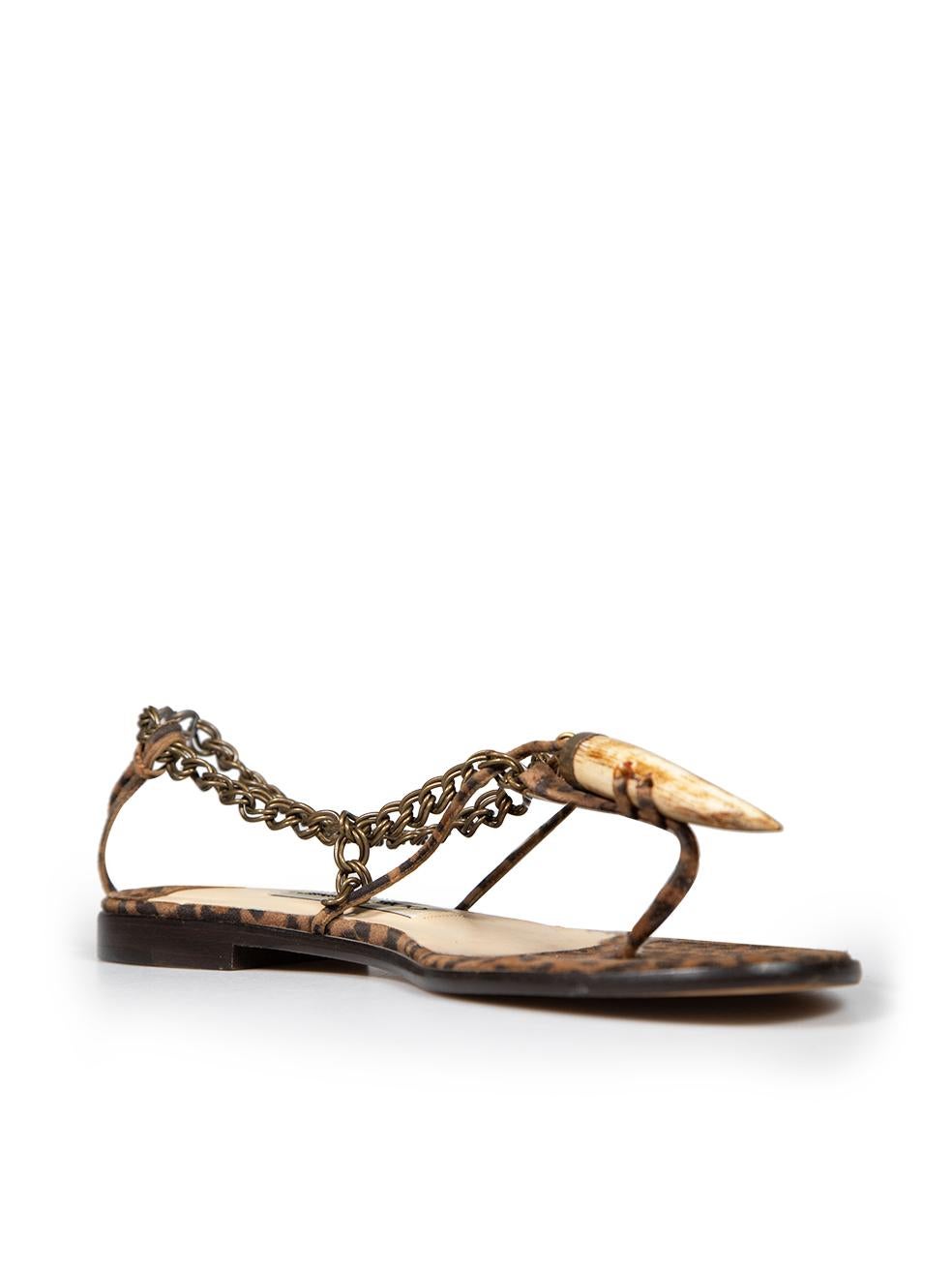CONDITION is Very good. Minimal wear to shoes is evident. Minimal abrasions to the soles on this used Jimmy Choo designer resale item. Comes with dust bag.
 
 
 
 Details
 
 
 Brown
 
 Suede
 
 Sandals
 
 Thong strap
 
 Open toe
 
 Horn detail
 
