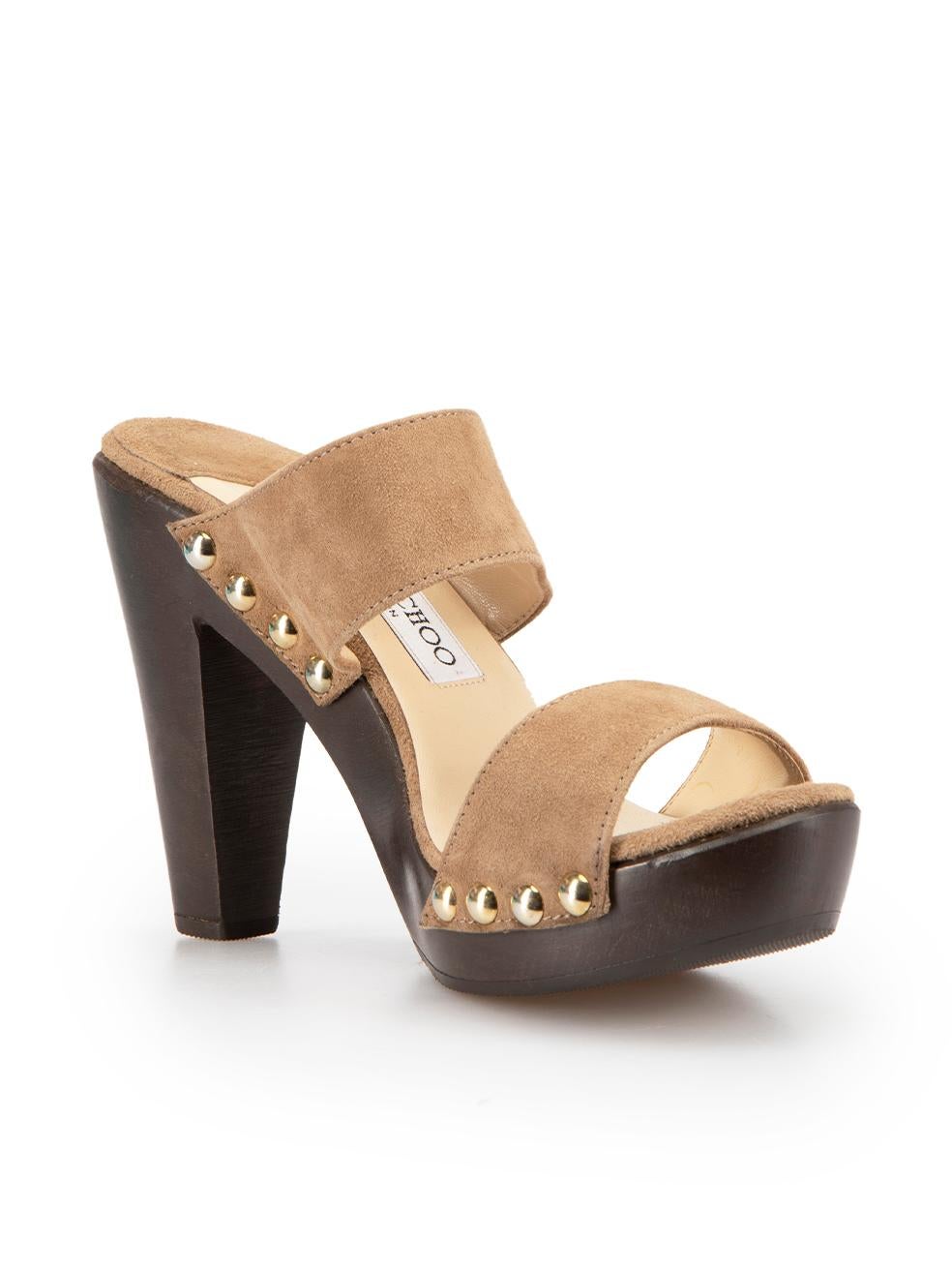 CONDITION is Very good. Hardly any visible wear to sandals is evident on this used Jimmy Choo designer resale item.
  
Details
Brown
Suede
Sandals
Open toe
Platform wooden heel
Studded accent

Made in Italy
  
Composition
EXTERIOR: Suede
INTERIOR: