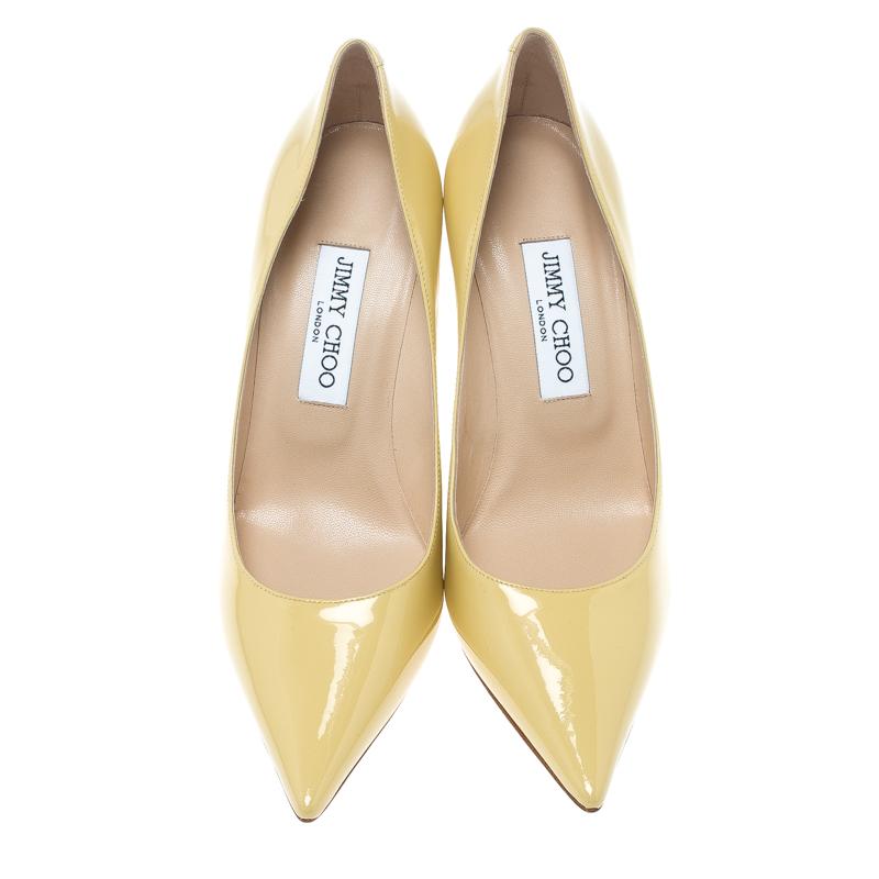 These classy pumps from Jimmy Choo are worth splurging on. Crafted from leather, they carry a gorgeous butter yellow shade with pointed toes, comfortable insoles, and 9.5 cm heels. Walk in them and you are sure to have a blissful day.

Includes: The
