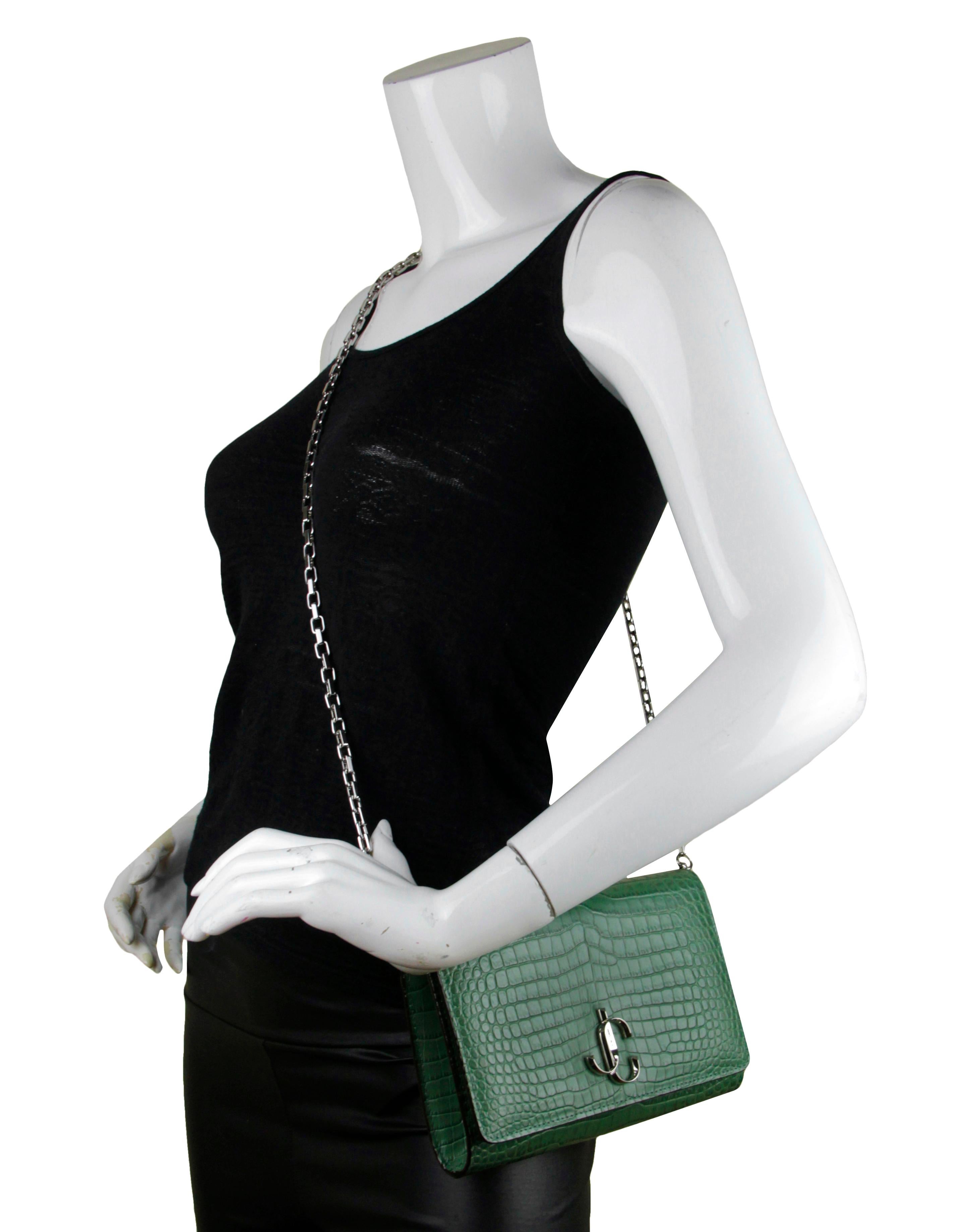 Jimmy Choo Cactus Green Embossed Crocodile Varenne Crossbody/ Clutch Bag 

Made In: Italy
Color: Cactus green
Hardware: Silvertone
Materials: Crocodile emboased leather
Lining: Satin
Closure/Opening: Flap with magnet
Exterior Pockets: Back