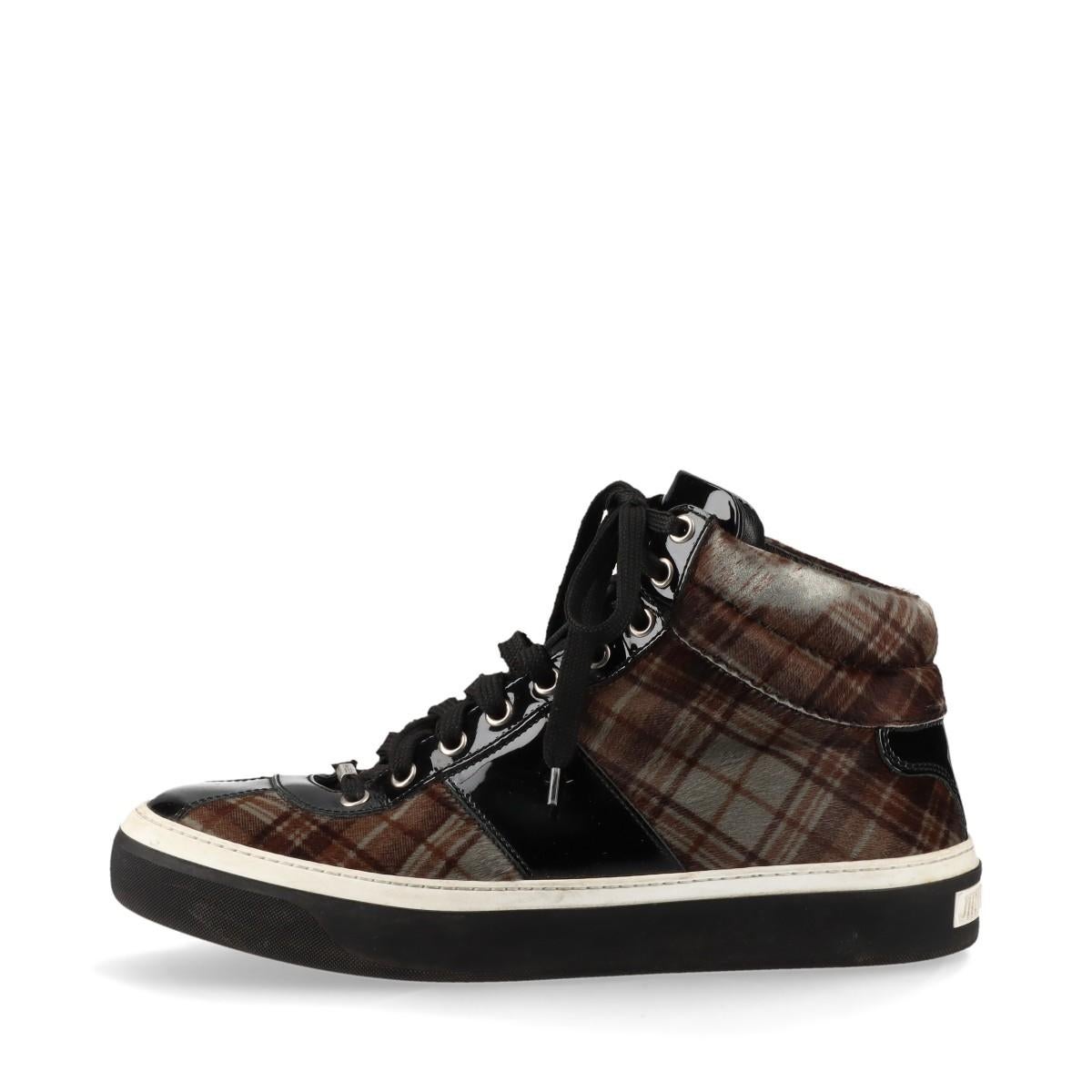 *will ship around 11/15

The Jimmy Choo Check Fabric High-top Sneakers in black and brown offer a stylish blend of luxury and streetwear. Crafted from premium check fabric, the high-tops feature a bold black and brown pattern that adds a modern edge