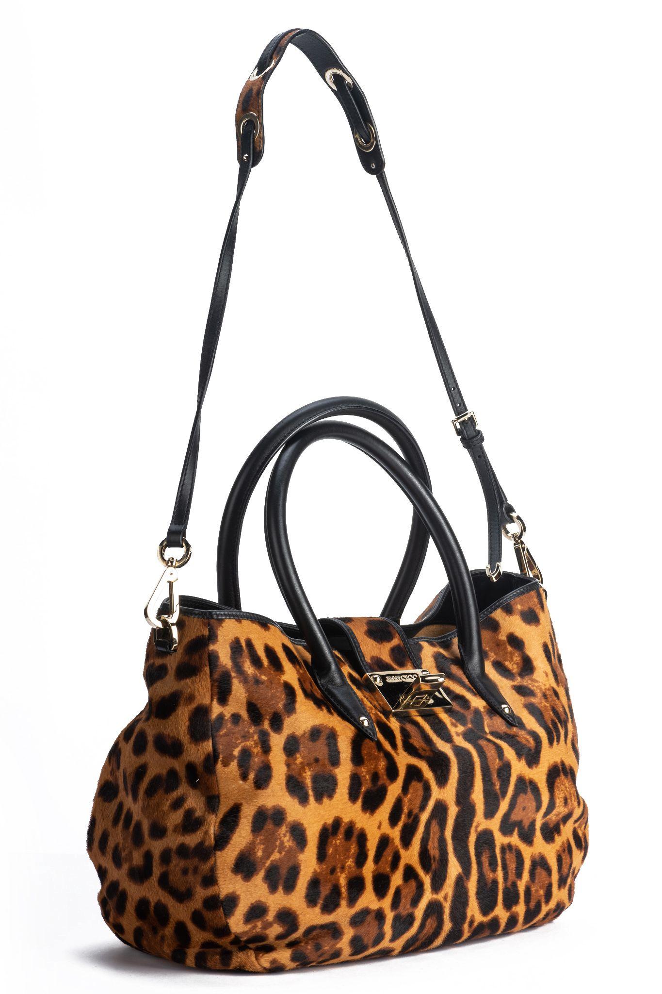 Jimmy Choo large cheetah print pony hair new handbag. Handle drop 6”, shoulder 18”. Original dust cover.