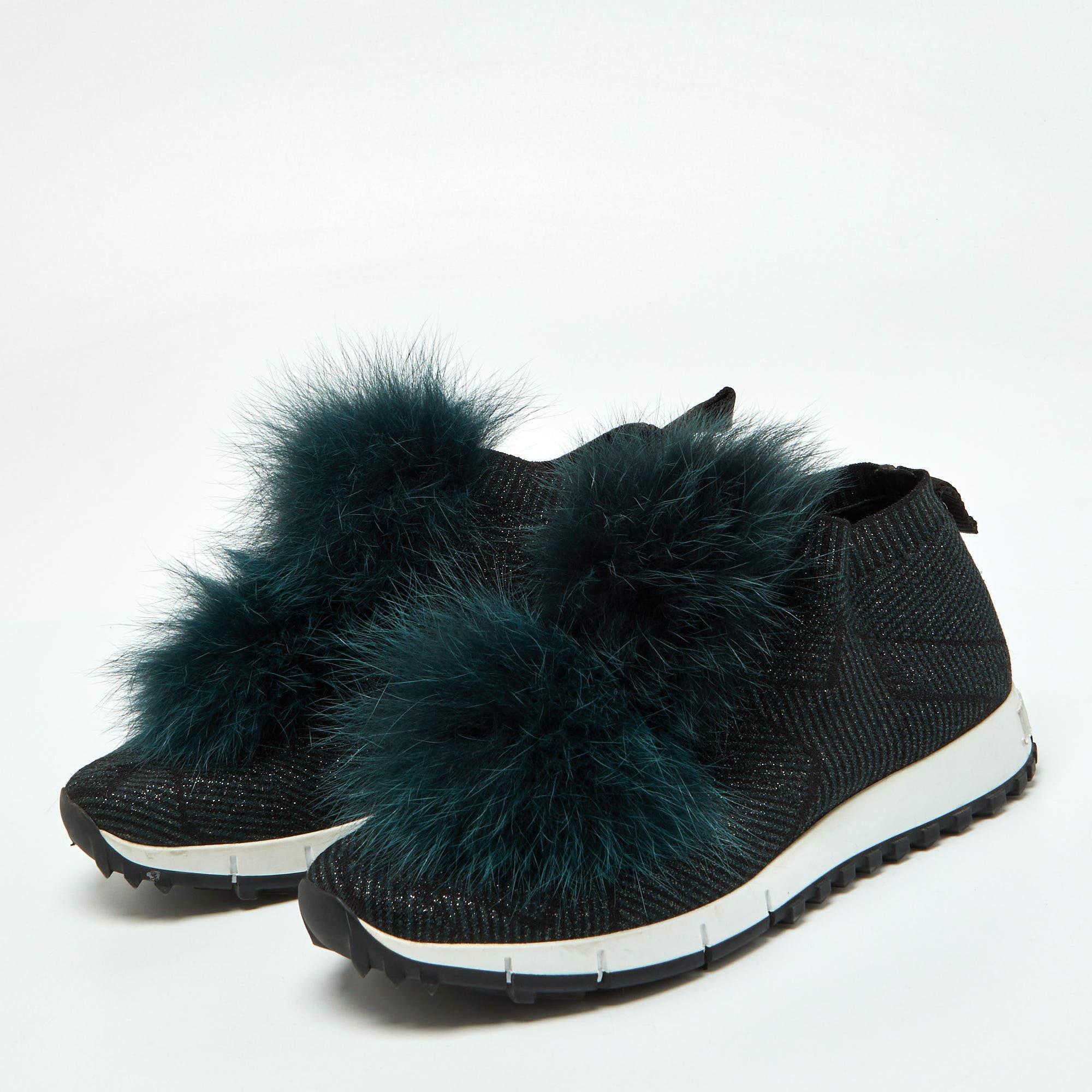 Here is Jimmy Choo's fun take on sneakers! Crafted in knit fabric, the low-top sneakers have a slip-on style and statement fur pom-pom details on the uppers. Try them on with dresses as well as jeans for a unique twist.


