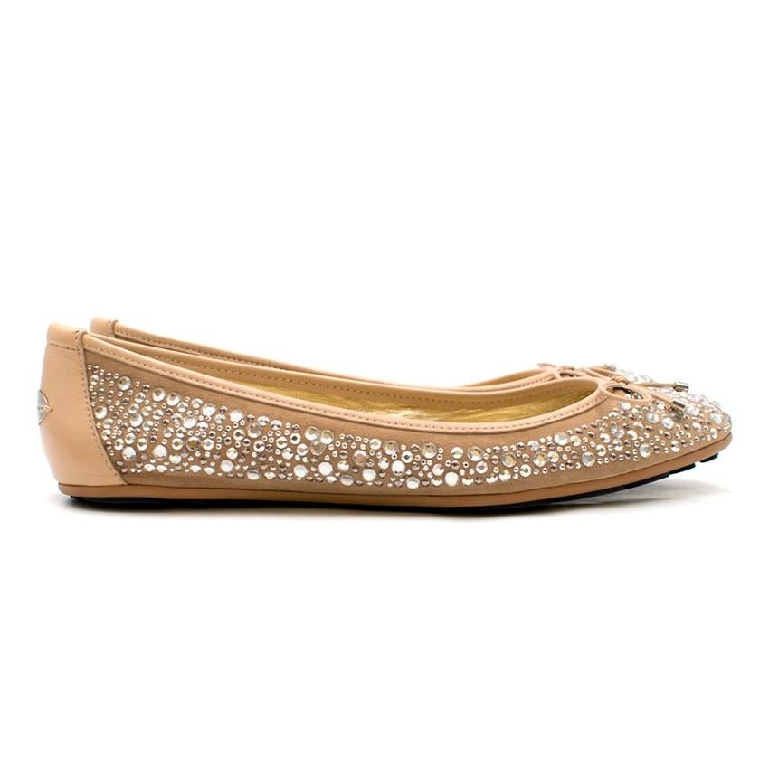 Jimmy Choo Diamante Ballet Flats

- Ballet style flats
- Nude suede upper encrusted with diamante silver rhinestones in all different sides
- Nude smooth leather trim, bow and rear tab
- Gold metallic leather lining with branding
- Rubber sole
-
