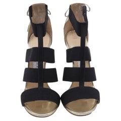 Sandales à talons Jimmy Choo à lanières élastiques, en cuir doré