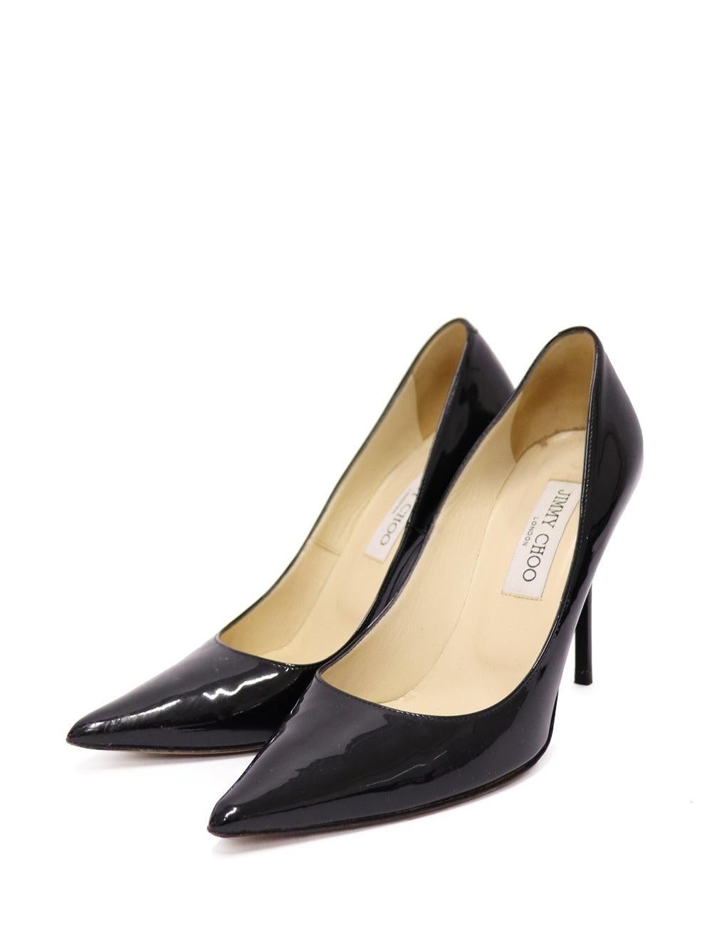 Jimmy Choo Romy 100 Black patent leather Pointy Toe pumps. The ever-classic Romy heel is updated for the new season in black patent. Leather lined with a leather sole, the 100mm heel height provides a leg-lengthening punch. Complement your evening