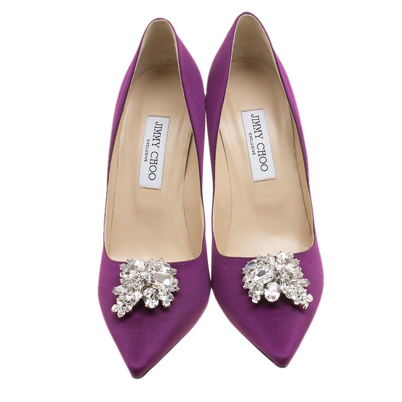 Jimmy Choo pumps are elegance personified. Steal some looks by donning this pair crafted from satin. Flaunting a purple hue, they have a crystal embellishment on the vamps and 11cm heel and are complete with leather-lined insoles.

Includes: