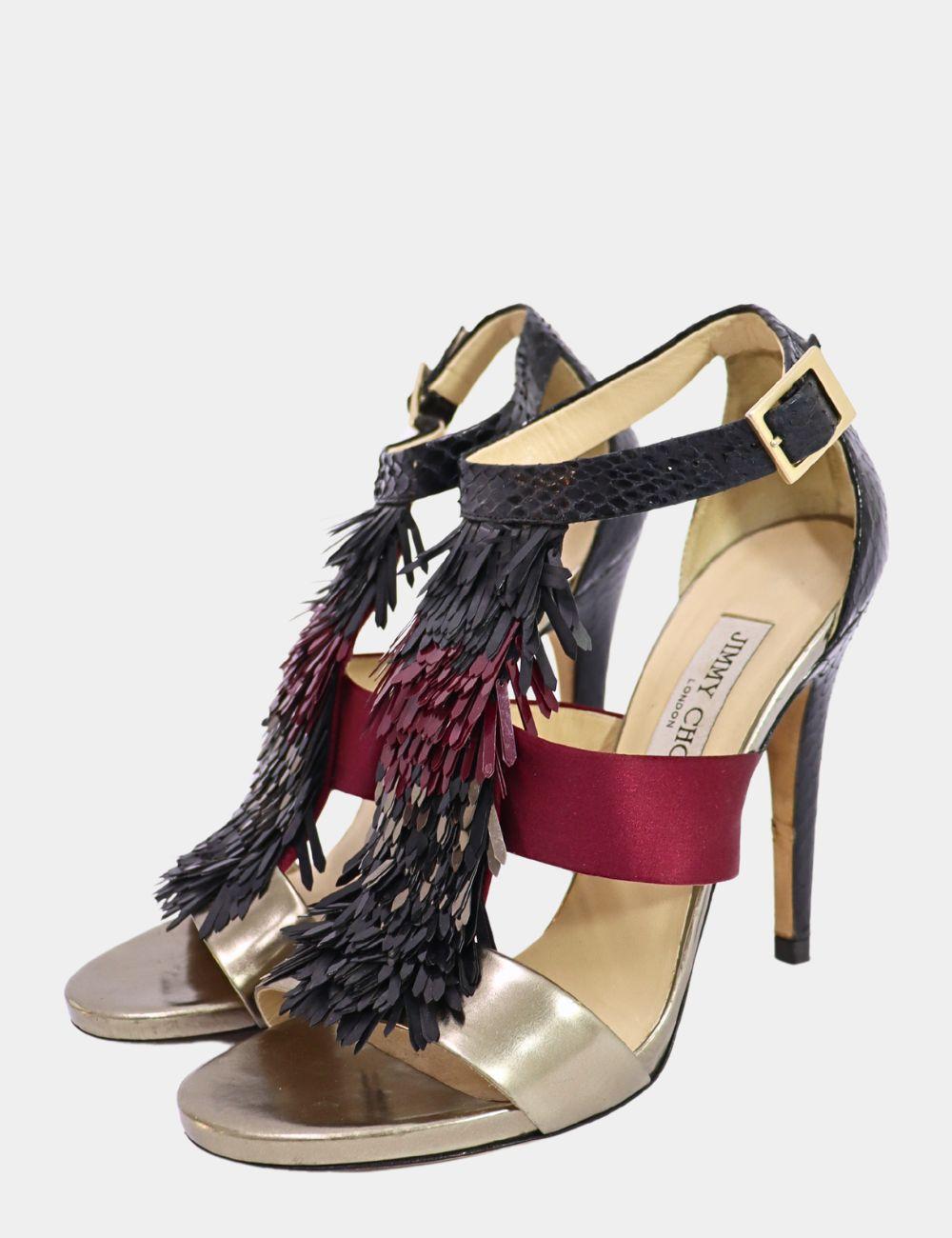 Jimmy Choo Fedora Fringe Sandals, Features a Tricolor Python, Satin and Leather, almond toe and slender heels.

Material: Leather 
Size: EU 38.5
Heel Height: 11cm
Overall Condition: Good
Interior Condition: Signs of use
Exterior Condition: Scratches