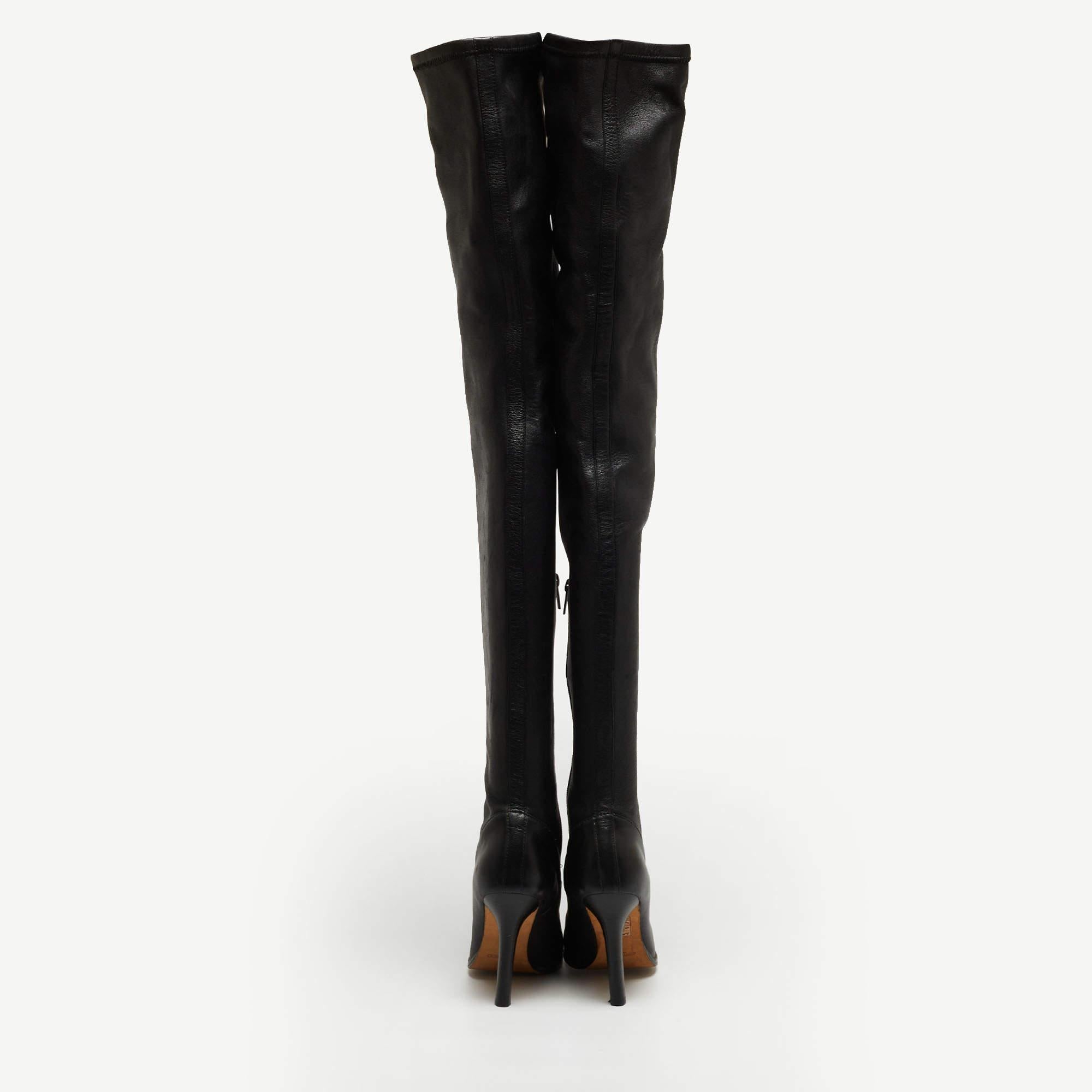 Jimmy Choo's Black Leather Thigh-High Boots exude sophistication and high fashion, a versatile and stylish addition to any wardrobe.

