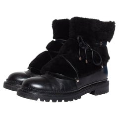 Jimmy Choo, Fur embellished leather lace up boots