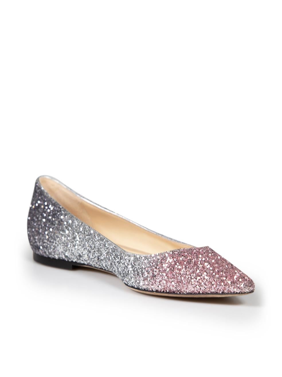 CONDITION is Very good. Minimal wear to flats is evident where the soles has been worn on this used Jimmy Choo designer resale item. This item comes with original dust bag and box.
 
 
 
 Details
 
 
 Model: Romy
 
 Multicolour - Silver and pink
 
