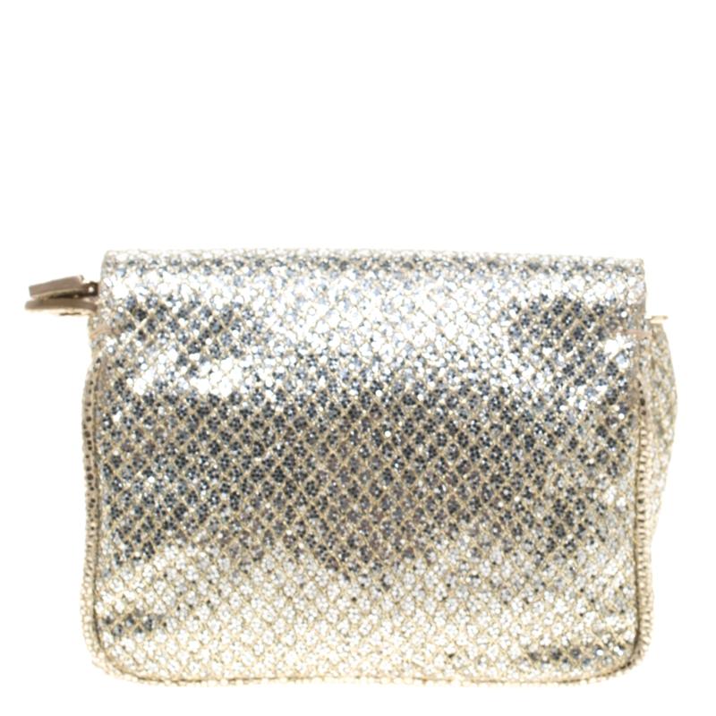 A bold and feminine design, this ‘Rebel’ crossbody bag by Jimmy Choo is crafted from glitter fabric. This bag has a fabric interior and the signature Jimmy Choo Rebel lock closure.

Includes: The Luxury Closet Packaging



