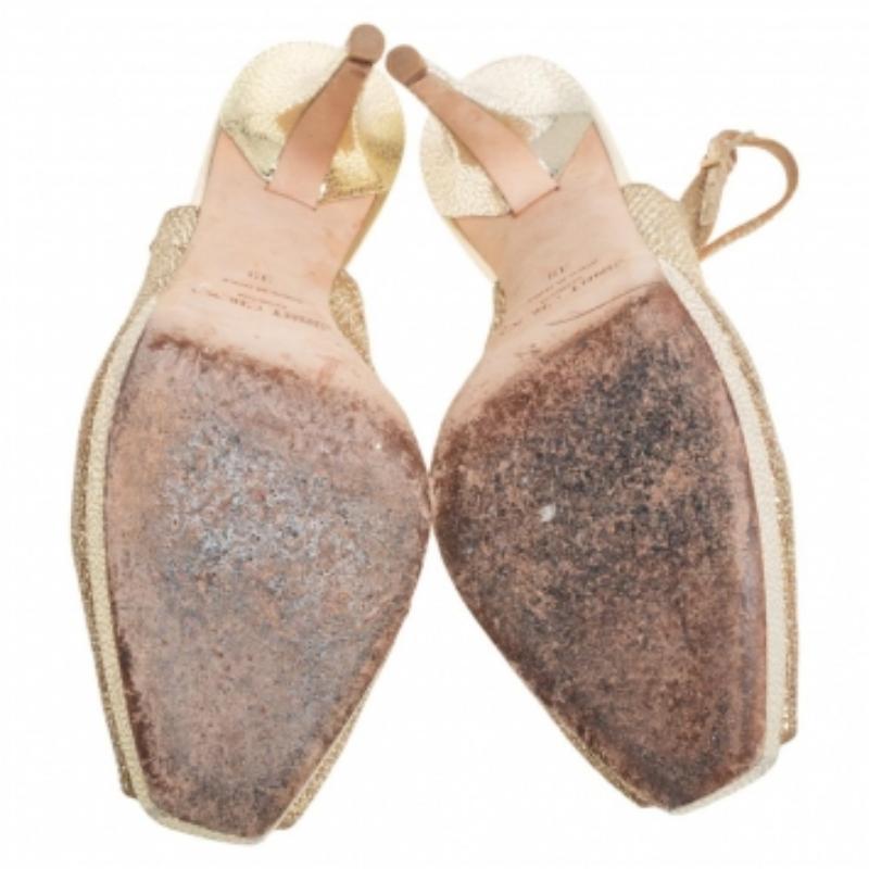 Those stylish outfits will look a lot more appealing with these gorgeous Nova platform sandals from Jimmy Choo. They have been crafted from glitter fabric into a peep-toe silhouette and styled with buckled slingbacks. They are made comfortable with
