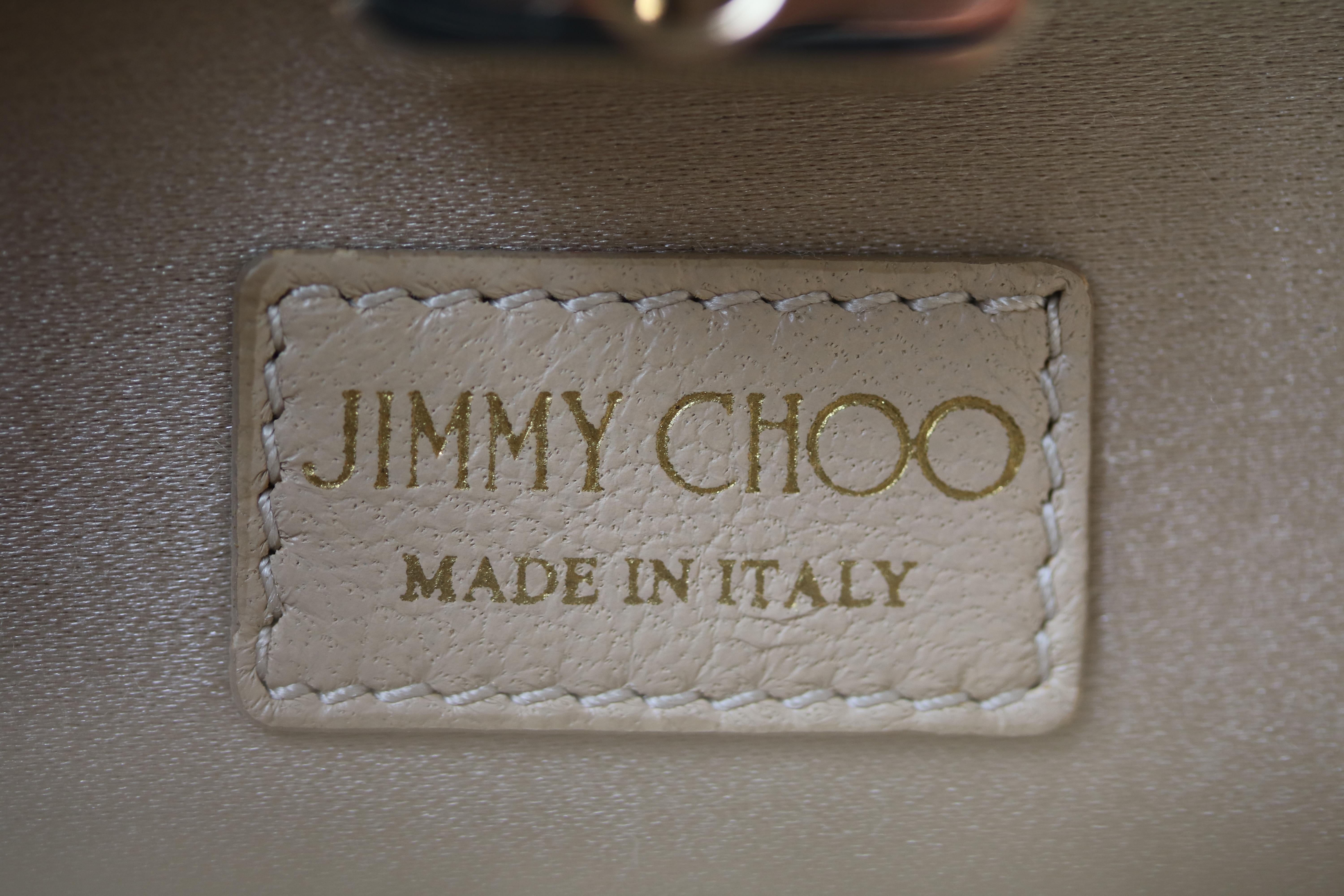Women's Jimmy Choo Gold leather Clutch